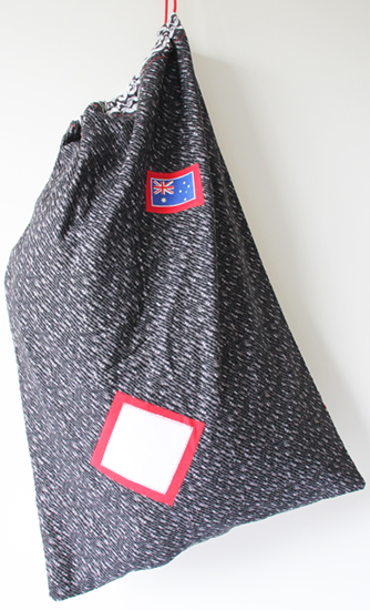 AUSSIE HERO LAUNDRY BAG by Doris Baxter-Gordon